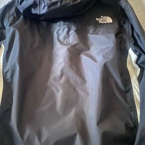 Northface hooded waterproof rain jacket … only worn once or twice ! Looks new !